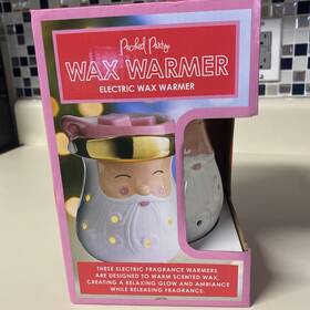 Packed Party 810102054777 New Wax Warmer Pink Santa. Pack Electric Nib