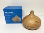 Victsing Essential Oil Diffuser, 300ML Humidifier W/ 7 Color Lights. Fixed Price $13.89.