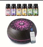 Aroma Essential Diffuser W/ Remote, Color Changing Led Night Light + Oils. Fixed Price $15.00.