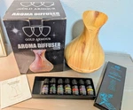 Gold Armour Aroma Diffuser 400ML Wood Grain With Radha Beauty Essential Oils Set. Fixed Price $30.00.