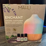 Mahli Enchant Aroma Diffuser - 7 Color Cycling Led Lights 3 Oils & 6 Scent Pads. Fixed Price $17.00.