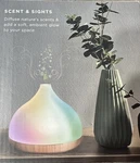 Mahli Enchant Aroma Diffuser - 7 Color Cycling Led Lights 3 Oils & 6 Scent Pads. Fixed Price $20.00.