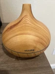 Victsing Essential Oil Diffuser, 300ML Humidifier W/ 7 Color Lights. Fixed Price $10.00.