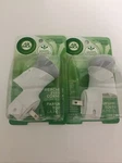 2 Air Wick Scented Oil Freshener Warmers. Fixed Price $8.44.