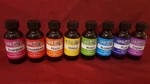 8 Assorted Home Fruit Scented Fragrance Therapeutic Oils In Glass Bottles.. Fixed Price $18.37.