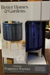 Better Homes & Gardens Plug In Blue Ceramic Wax Fragrance Warmer W/ Wood Stand. Fixed Price $18.00.