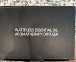 Waterless Essential Oil Aromatherapy Diffuser E200, 20ML Electric, Black. Fixed Price $20.00.