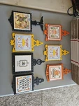 Vintage Cast Iron Trivets Set Of 7 Amazing Bright Colors. Fixed Price $55.00.