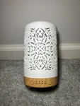 Earnest Living White Ceramic Essential Oil Diffuser With Timer Night Light. Fixed Price $25.00.
