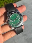 Green Dial Wristwatch 24-HOUR Bezel Black Rubber Strap Date Luminous Hands. Fixed Price $160.00.