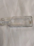 Apothecary Hall Embossed Clear Glass 2 Oz. Medicine Bottle. Fixed Price $20.00.