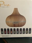 New Pure Daily Care Aromatherapy Bundle Ultra Sonic Diffuser + 10 Essential Oils. Fixed Price $23.64.