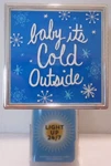 Bath & Body Works Wallflower Diffuser Plug Blue Light-up Baby It's Cold Outside. Fixed Price $23.99.