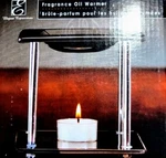 Never Opened! Elegant Expressions Fragrance Oil Warmer!. Fixed Price $21.21.