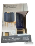 Better Homes & Gardens Plug In Blue Ceramic Wax Fragrance Warmer W/ Wood Stand. Fixed Price $19.00.