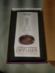 Aromis - Professional Wood & Glass Aromatherapy Nebulizing Diffuser. Fixed Price $80.00.