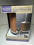 Better Homes Gardens Cool Mist Ultrasonic 100ML Aroma Diffuser Woodgrain. Fixed Price $15.99.