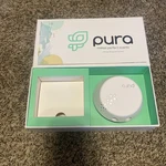Electric Plug In Air Freshener Device Only Model 003PURA US66B0003UT. Fixed Price $24.99.