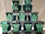 9 Glade Enchanted Evergreen Sparkling Fir & Holly Berry Candles No Outer Logo. Fixed Price $54.95.