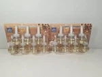 14 Refills Glade Cozy Vanilla Cappuccino Scented Oil. Fixed Price $39.99.