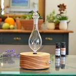 Aromis - Professional Wood & Glass Aromatherapy Nebulizing Diffuser. Fixed Price $96.99.