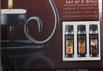 New Elegant Expressions Metal Warmer Gift Set With 3 Cinnamon Scented Oils. Fixed Price $15.00.
