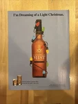 1999 Canadian Mist Whiskey Bottle Wrapped In Christmas Lights. Fixed Price $7.49.