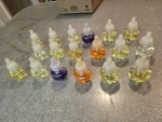 Lot Of 18 Scented Oil Warmer Various Refills Open Box. Fixed Price $30.00.