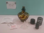 Tee Da Fragrance Lamp Amber Brown Swirls With 3 Lids And Manual & Funnel. Fixed Price $26.99.