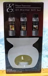 Elegant Expressions Oil Warmer Gift Set. Fixed Price $10.95.