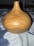 Victsing Essential Oil Diffuser, 300ML Humidifier W/ 7 Color Lights. Fixed Price $12.00.