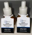 2 Mainstays Sweet Sugared Lemon Aroma Accents Fragrance Plug Oil Refills. Fixed Price $11.99.