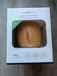 Serene House Lotus Ultrasonic Essential Oils Diffuser Auto Wood Pattern Glass. Fixed Price $40.00.