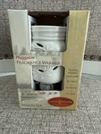 New In Box - Candle Warmers Pluggable Mason Jar Fragrance. Fixed Price $11.00.