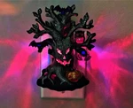 Bath & Body Works Halloween Night Light Glowing Wallflower Plug Monster Tree. Fixed Price $25.00.