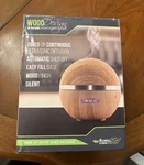 Ultrasonic Diffuser By AROMA2GO Color Changing Led, Wood Finish, Silent, New. Fixed Price $15.99.