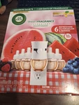Air Wick Scented Oil Watermelon Scent, Plug-in, (6-0.67 Oz Refills & 1 Warmer). Fixed Price $34.50.