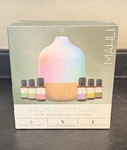 Mahli Aroma Diffuser With Color Changing Feature 6 Essential Oils. Fixed Price $35.00.