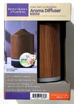 Better Homes & Gardens Cool Mist Ultrasonic Aroma Diffuser Woodgrain. Fixed Price $33.99.