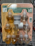 Airwick Scented Oils 1 Plug-in + 9 Refills Variety Pack Apple & Hawaii Scents. Fixed Price $31.06.