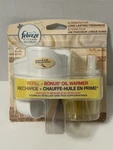New Febreze Plug Scented Oil Warmer & Refill Fluffy Vanilla Discontinued. Fixed Price $27.99.
