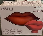 Mahli Red Lips Aroma Diffuser With 6 Essential Oil Pads Soft White Glow New. Fixed Price $26.99.