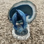 Blue Dolphins Jumping Front Of Slab Agate Candle Holder. Fixed Price $15.00.