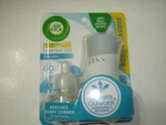 Airwick Essential Oils Starter Kit Warmer Plug-in With Refill Fresh Linen. Fixed Price $9.95.